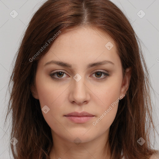 Neutral white young-adult female with long  brown hair and brown eyes