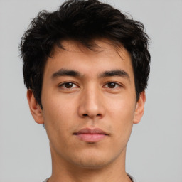 Neutral asian young-adult male with short  brown hair and brown eyes