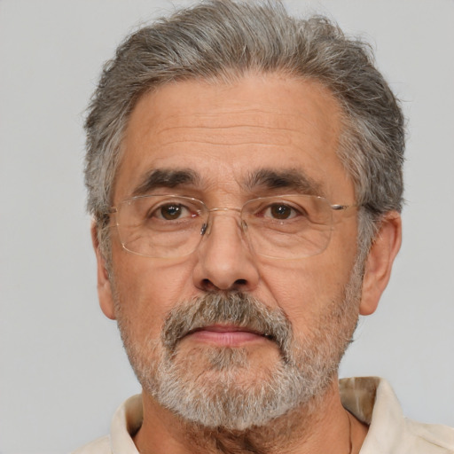 Neutral white middle-aged male with short  gray hair and brown eyes