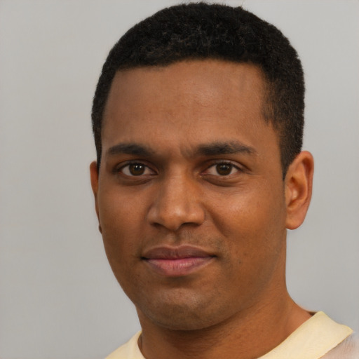 Neutral black young-adult male with short  black hair and brown eyes