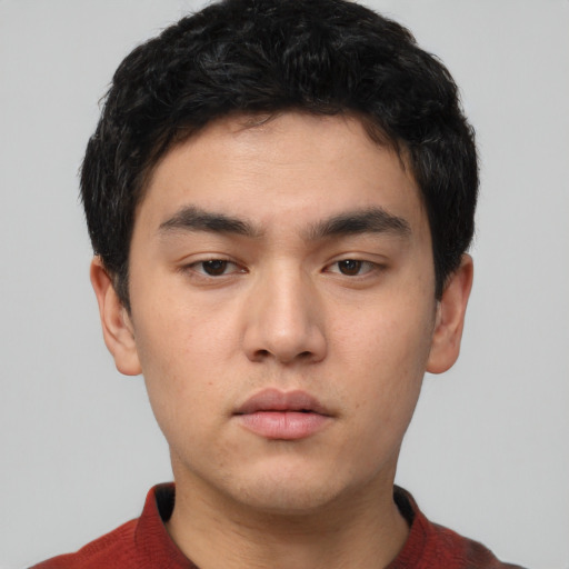 Neutral white young-adult male with short  black hair and brown eyes