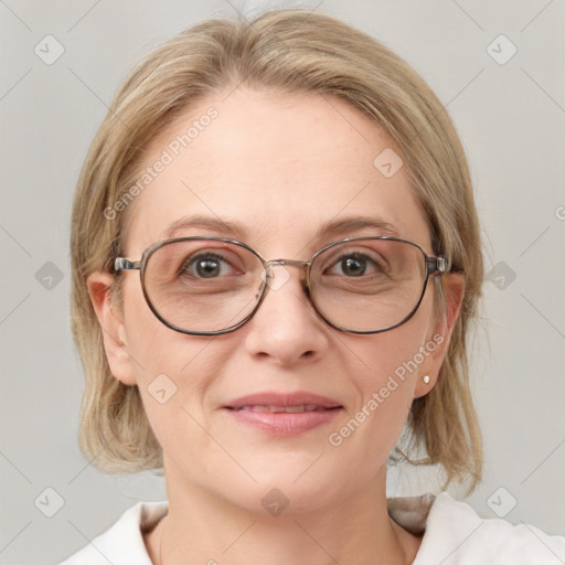 Joyful white adult female with medium  brown hair and blue eyes