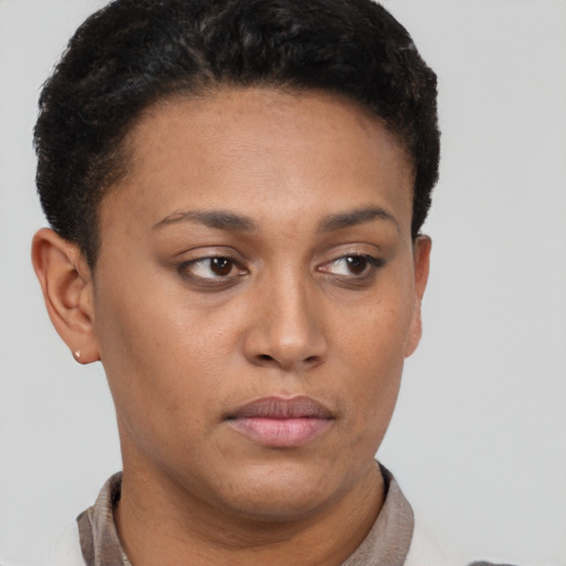 Neutral latino young-adult female with short  brown hair and brown eyes