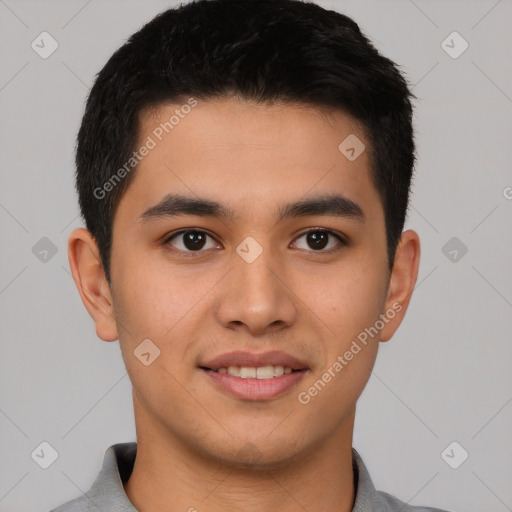 Joyful latino young-adult male with short  brown hair and brown eyes