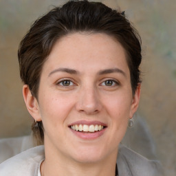 Joyful white young-adult female with medium  brown hair and brown eyes