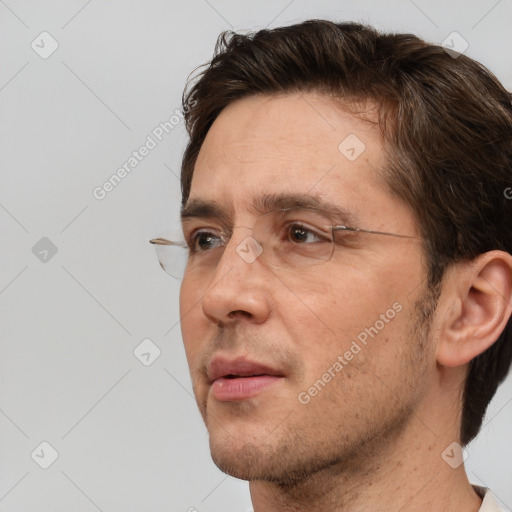 Neutral white adult male with short  brown hair and brown eyes