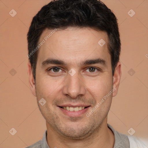 Joyful white young-adult male with short  brown hair and brown eyes