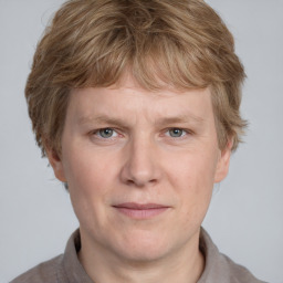 Joyful white adult male with short  brown hair and grey eyes