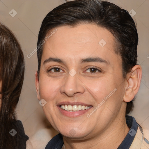 Joyful white adult female with medium  brown hair and brown eyes