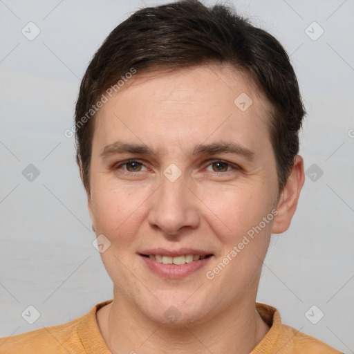 Joyful white young-adult female with short  brown hair and brown eyes