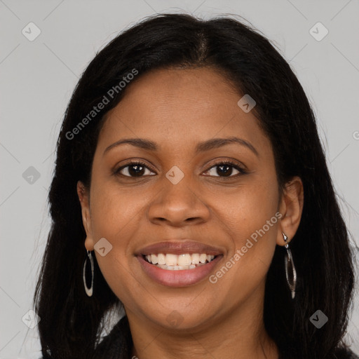 Joyful black young-adult female with long  brown hair and brown eyes