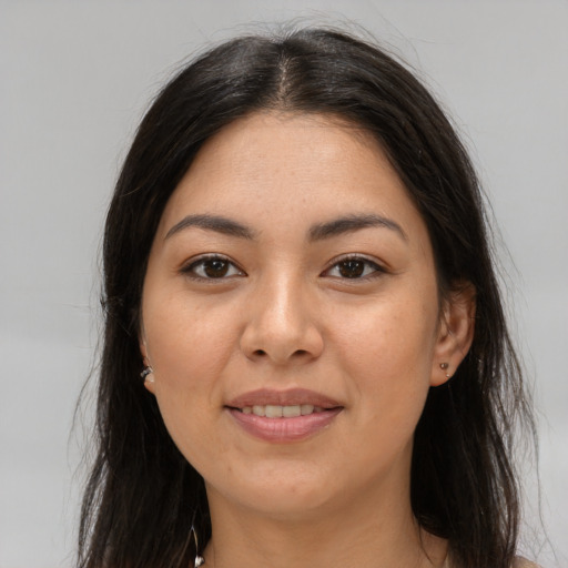 Joyful asian young-adult female with long  brown hair and brown eyes