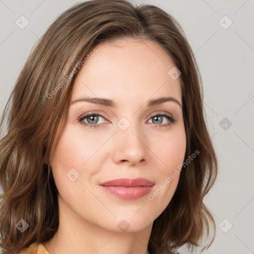 Joyful white young-adult female with medium  brown hair and green eyes