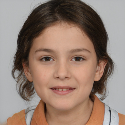 Joyful white child female with medium  brown hair and brown eyes