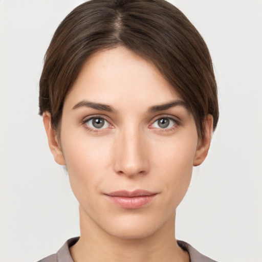 Neutral white young-adult female with short  brown hair and brown eyes