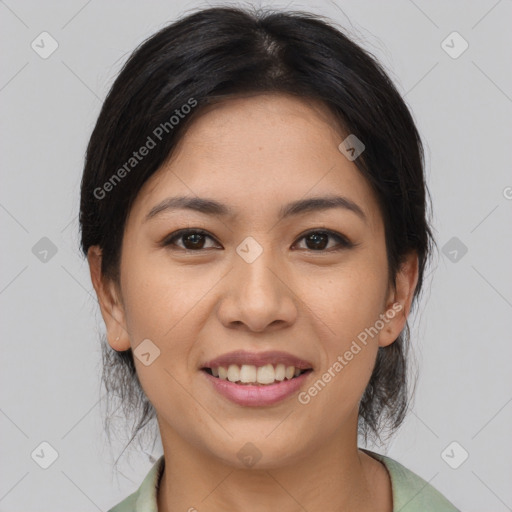 Joyful asian young-adult female with medium  black hair and brown eyes