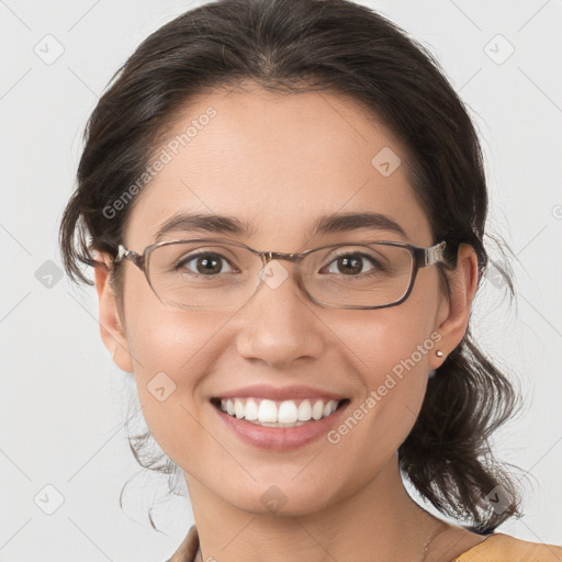 Joyful white young-adult female with medium  brown hair and brown eyes