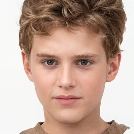 Joyful white child male with short  brown hair and grey eyes