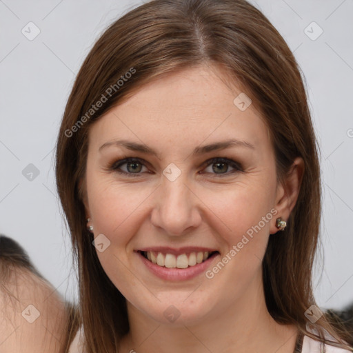 Joyful white young-adult female with medium  brown hair and brown eyes