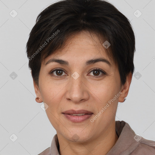 Joyful white adult female with short  brown hair and brown eyes