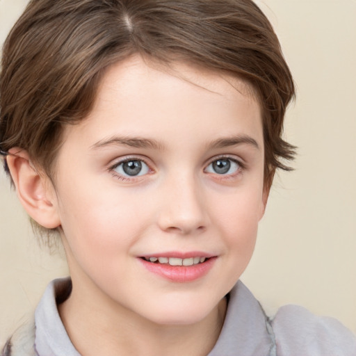 Joyful white child female with short  brown hair and grey eyes