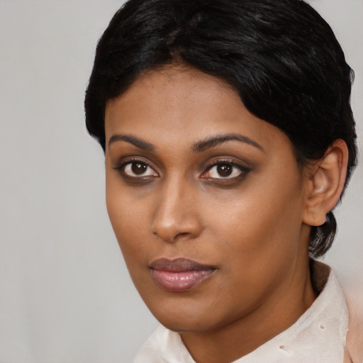 Neutral asian young-adult female with short  black hair and brown eyes