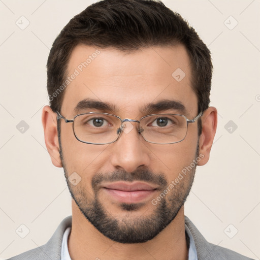 Joyful white young-adult male with short  black hair and brown eyes