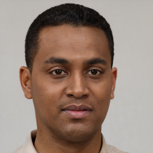 Neutral black young-adult male with short  black hair and brown eyes