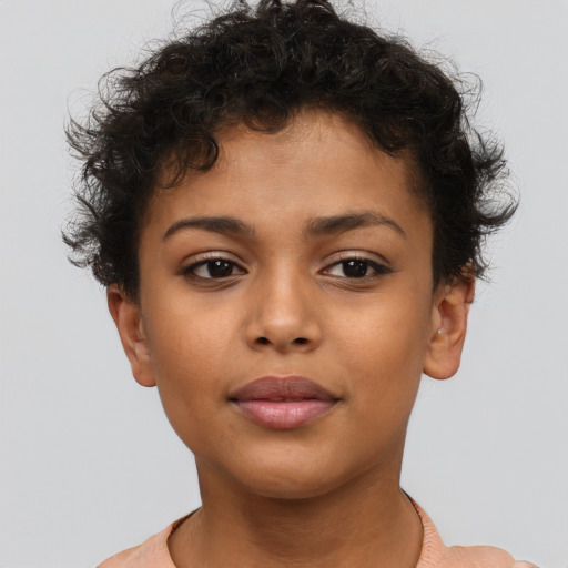 Neutral latino child female with short  brown hair and brown eyes