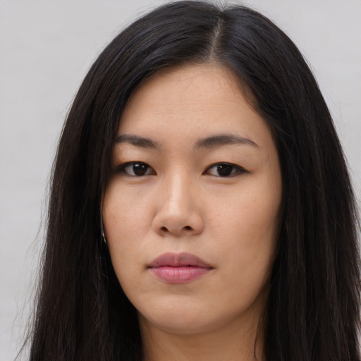 Neutral asian young-adult female with long  brown hair and brown eyes