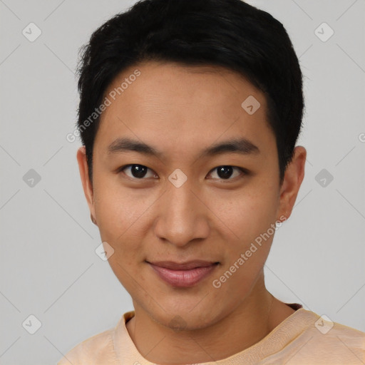 Joyful asian young-adult male with short  black hair and brown eyes