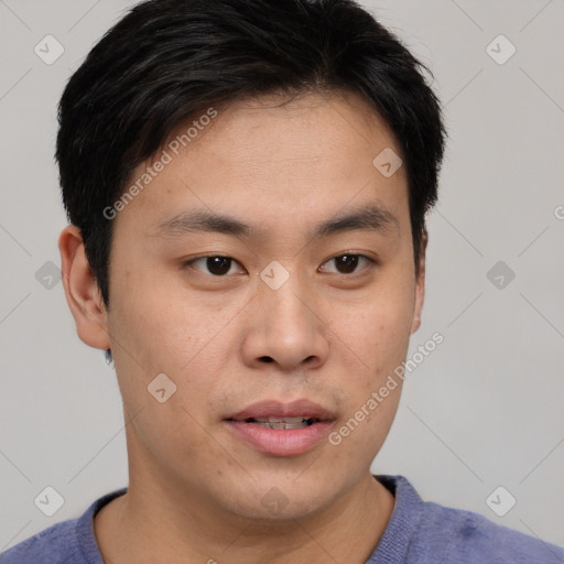 Neutral asian young-adult male with short  brown hair and brown eyes