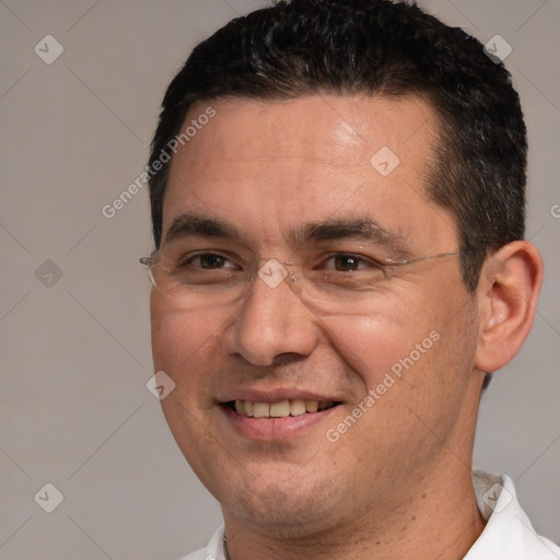 Joyful white adult male with short  brown hair and brown eyes