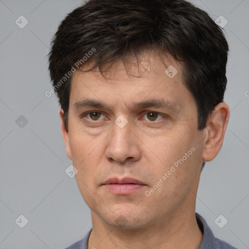 Neutral white adult male with short  brown hair and brown eyes