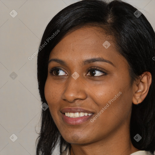 Joyful asian young-adult female with medium  black hair and brown eyes