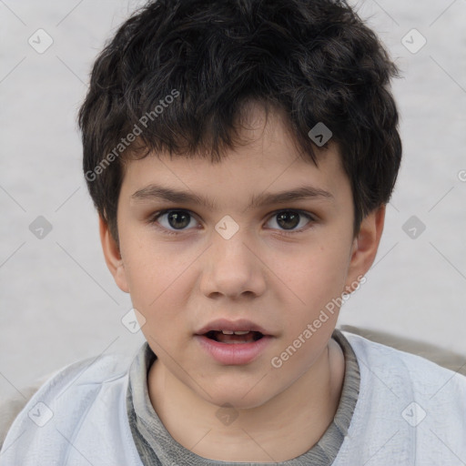 Joyful white child male with short  brown hair and brown eyes