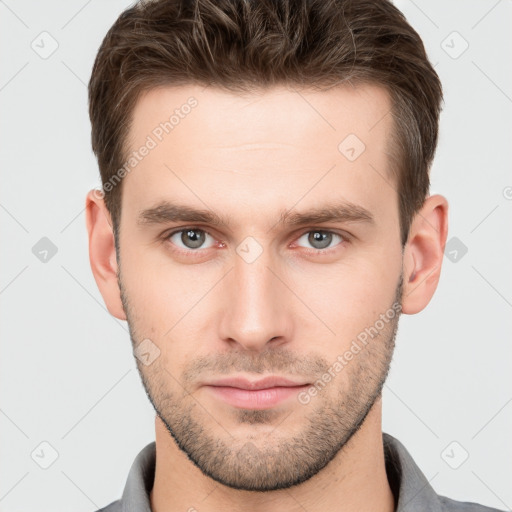 Neutral white young-adult male with short  brown hair and grey eyes