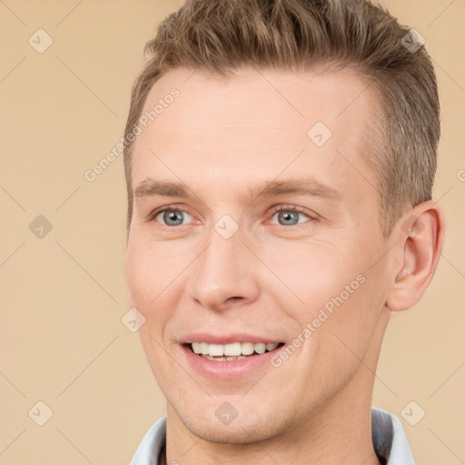 Joyful white adult male with short  brown hair and brown eyes