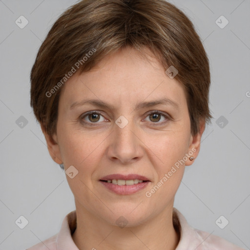 Joyful white adult female with short  brown hair and grey eyes