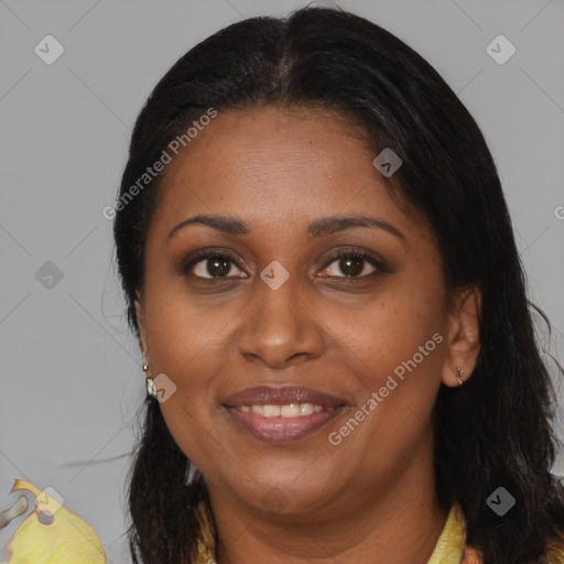 Joyful black adult female with medium  brown hair and brown eyes