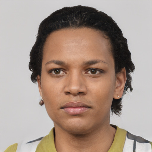 Neutral latino young-adult female with short  black hair and brown eyes