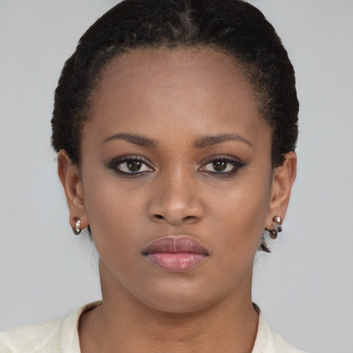 Neutral black young-adult female with short  brown hair and brown eyes