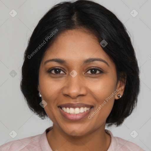 Joyful black young-adult female with medium  black hair and brown eyes