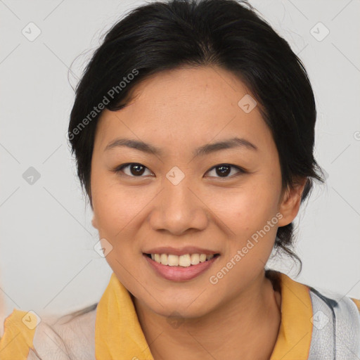 Joyful asian young-adult female with medium  black hair and brown eyes