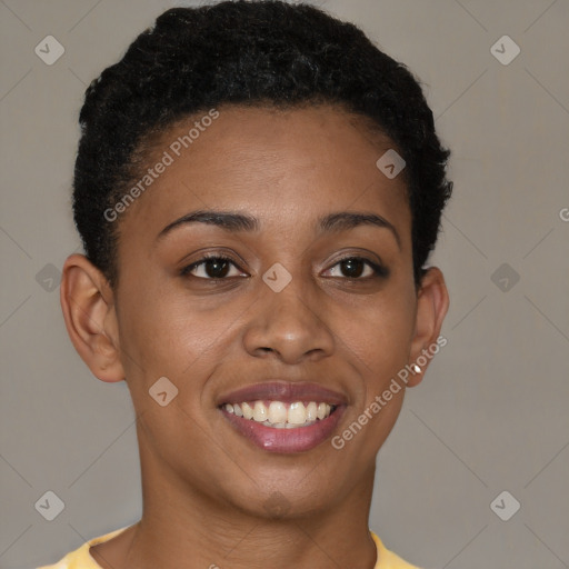 Joyful black young-adult female with short  brown hair and brown eyes