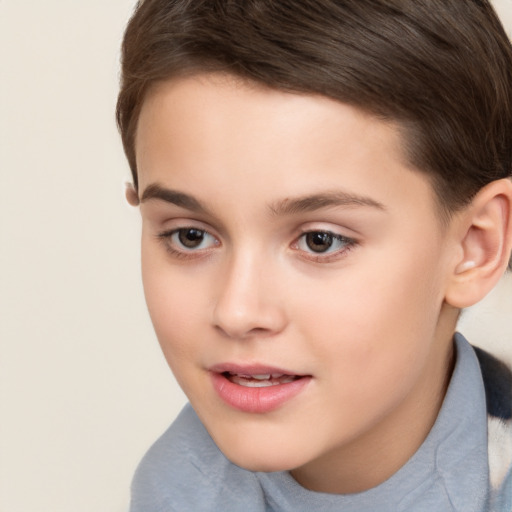 Joyful white child female with short  brown hair and brown eyes