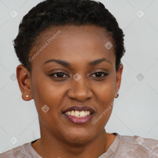 Joyful black young-adult female with short  brown hair and brown eyes