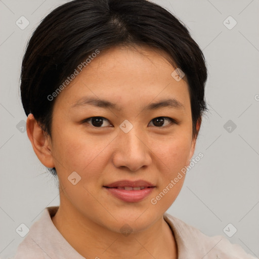 Joyful asian young-adult female with short  brown hair and brown eyes