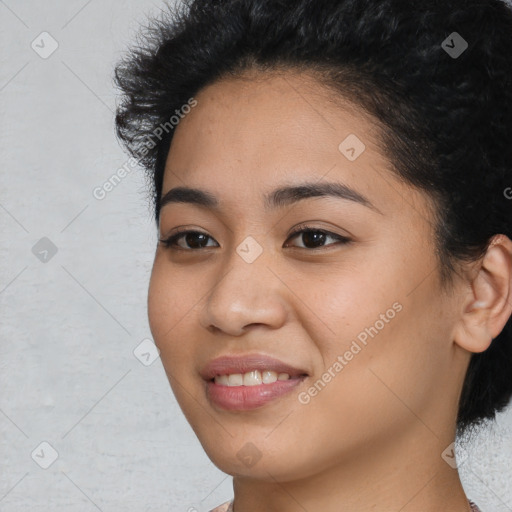 Joyful latino young-adult female with medium  black hair and brown eyes