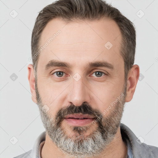 Neutral white adult male with short  brown hair and brown eyes